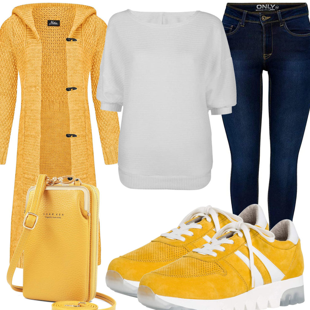 Gelbes Frauenoutfit mit Strickjacke, Tasche und Sneakern