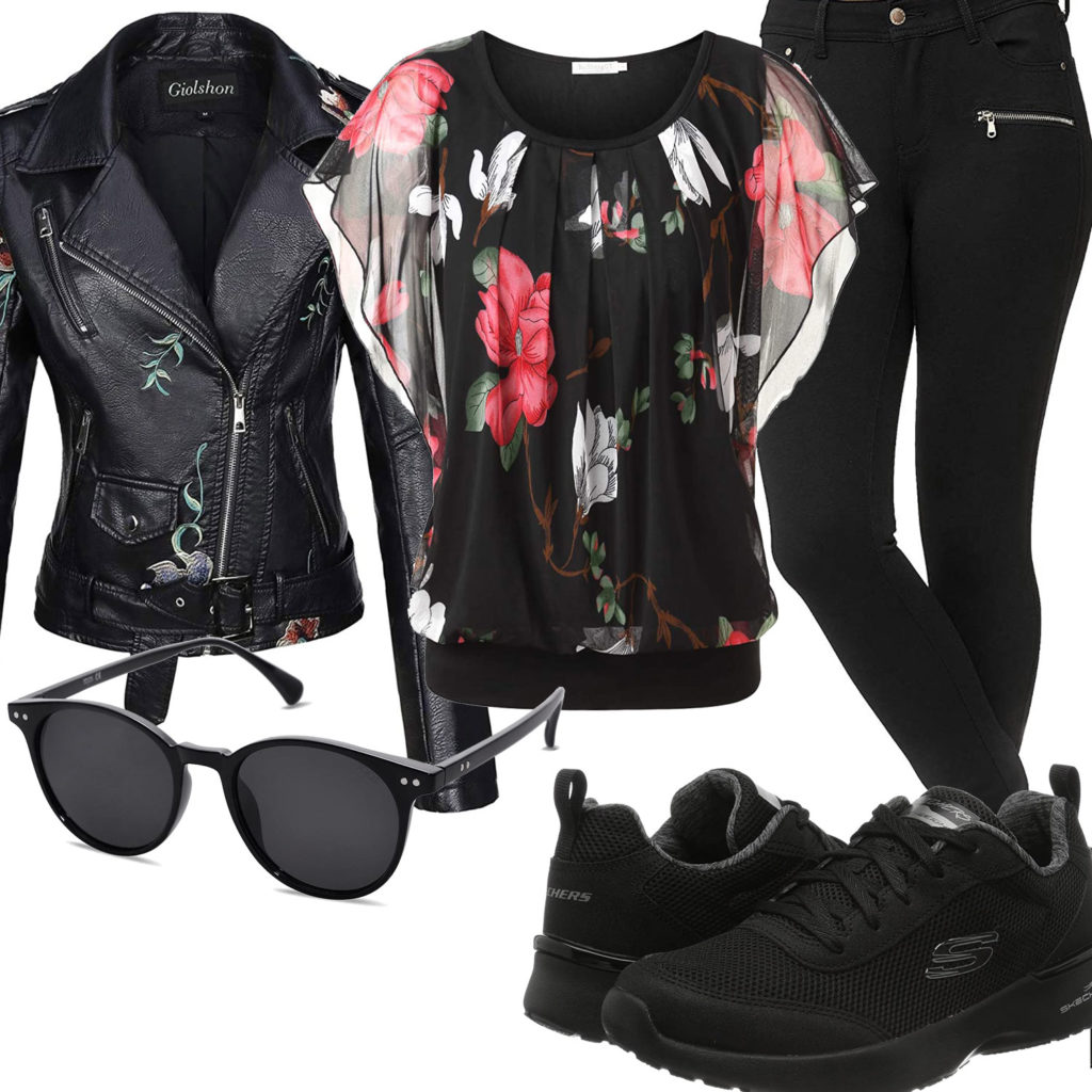 Schwarzes Frauenoutfit mit Blumen-Bluse und Lederjacke