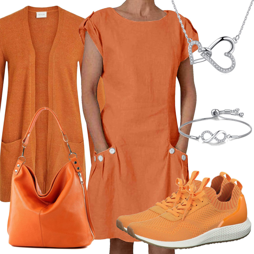 Oranges Frauenoutfit mit Kleid, Strickjacke und Sneakern