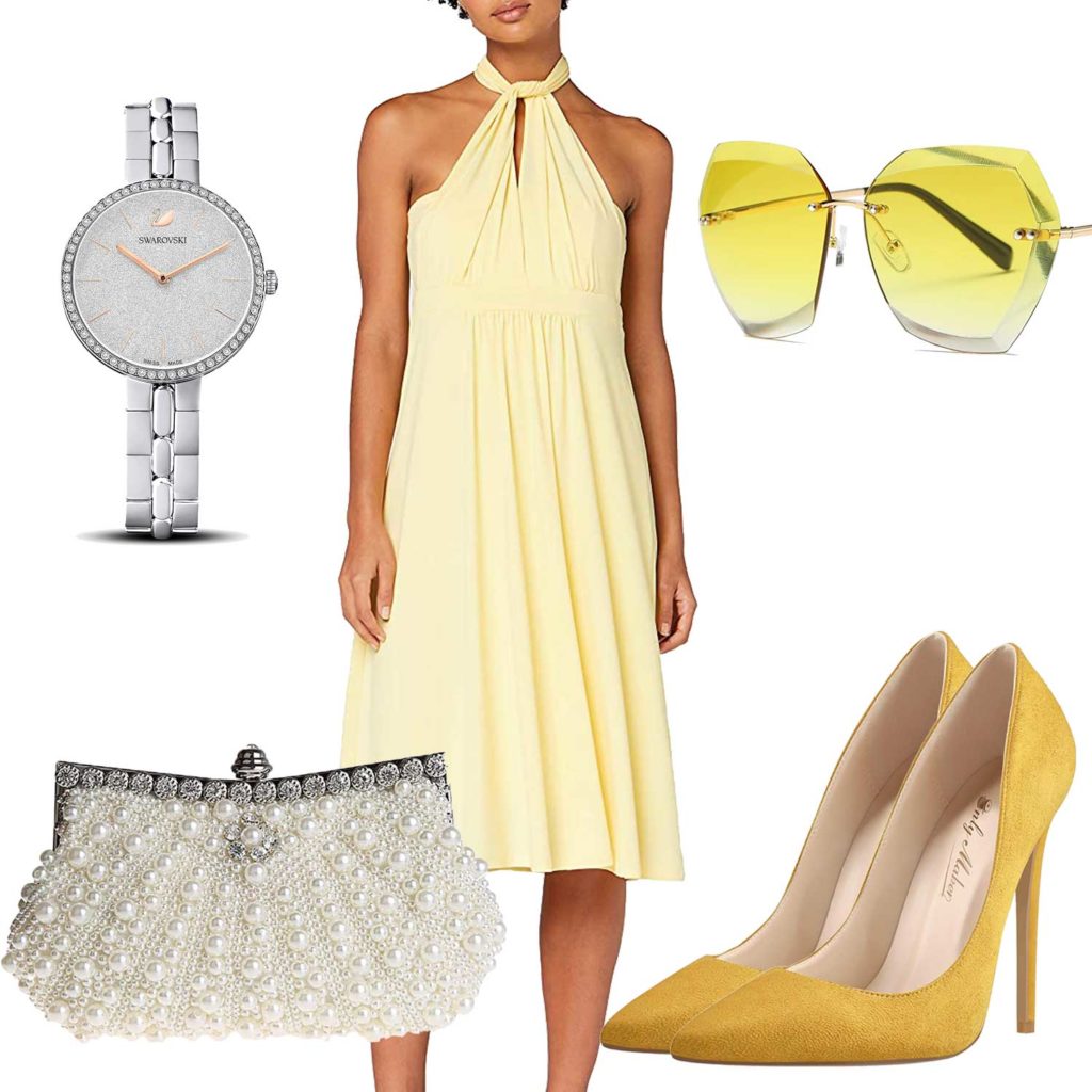 Gelbes Damenoutfit mit Pumps und Sonnenbrille