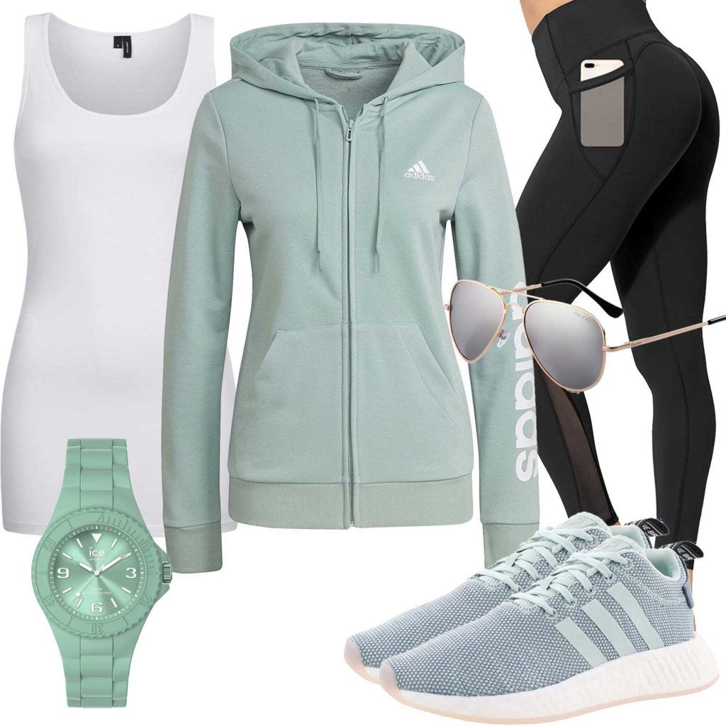 Sportliches Damenoutfit mit Hoodie, Uhr und Sneakern