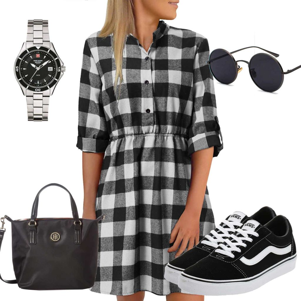 Schwarz-Weißes Damenoutfit mit Kleid und Uhr